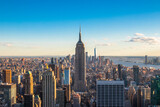 Fototapeta  - Panoramic view of The Empire State Building, Manhattan downtown and skyscrapers at sunset.