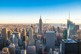 Fototapeta Nowy Jork - Panoramic view of The Empire State Building, Manhattan downtown and skyscrapers at sunset.