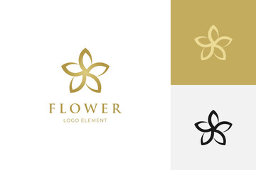 Wall Mural - elegant golden flower logo icon design element with star combined design concept for beauty, skin care, cosmetics brand logo symbol