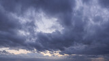 Fototapeta Na sufit - Moody wild sky panorama cloudscape background during sunset