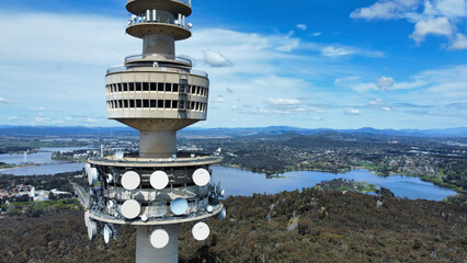 Aerial close-up view of Telstra Tower in Canberra, the capital of Australia showing a beautiful panoramic view of the city and Lake Burley Griffin