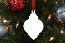 Vintage Christmas Ornament Mockup Styled On Lit-Up Christmas Tree