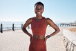 Fitness, portrait or black woman runner ready for cardio training, workout or exercise by a beach in Cape Town. Wellness, face or healthy sports girl with a happy smile or freedom with body goals