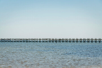 Views of a privately owned pier from the shore in Destin, Florida