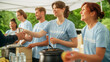 © Gorodenkoff - Group of Volunteers Preparing Free Food Rations for Poor People in Need. Charity Workers and Members of the Community Work Together. Concept of Giving, Humanitarian Aid and Society.