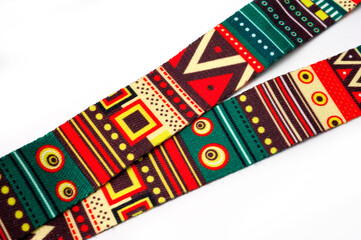 Neck strap in bright abstract neoprene for comfortable ukulele playing.