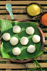 Sticker - Steamed Sticky Rice Ball, Usually Topped with Spicy or Sweet Shredded Coconut.