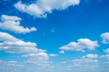 Wall Mural - blue sky background with white clouds