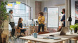 Expressive Project Manager Talking on a Team Meeting in Creative Agency Conference Room. Arab Female Showing Business Plan Presentation. Project Plan Presentation on Digital Whiteboard Monitor