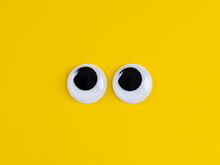 Cute Googly Eyes Funny Isolated On Bright Yellow Background Copy Space Logo