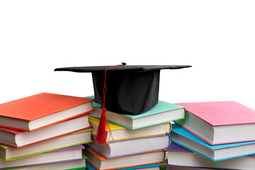 Stack school books with a black graduation hat