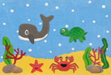 Fototapeta Dinusie - happy sea life animal made from plasticine on sand and sea under water background