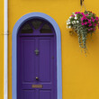 © Designpics - Purple door on a yellow house; Kinsale, County Cork, Ireland