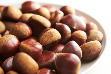 Sticker - chestnuts close-up on a plate