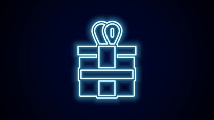 Wall Mural - Glowing neon line Gift box icon isolated on black background. 4K Video motion graphic animation