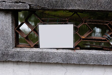 An Empty White Laminated Sign Attached To A Bridge