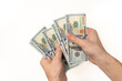 © Olena - Money in hand. Counting dollars.