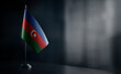 Small national flag of the Azerbaijan on a black background