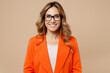 © ViDi Studio - Close up young fun happy successful employee business woman corporate lawyer 30s wearing classic formal orange suit glasses work in office look camera isolated on plain beige color background studio.