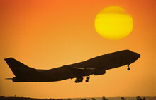 Boeing 747 At Sunset
