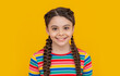 © be free - portrait of teen braided girl isolated on yellow background. teen girl with braided hair