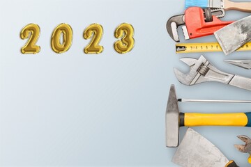 Wall Mural - 2023 numbers for new year and construction tools