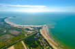 © huythoai - Aerial view of sea Mui Ne, Vietnam see the whole bay of Ke Ga from north to south bank shore very large with sea waves, ships, reefs is tourism potential Status of Vietnam.