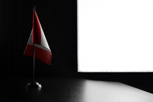 Small National Flag Of The Canada On A Black Background