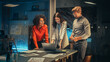 © Gorodenkoff - Multicultural Creative Colleagues Casually Joking, Discussing a New Business Opportunity, Talking in an Office Meeting Room, Using a Laptop and Tablet for Brainstorming Corporate Marketing Ideas.
