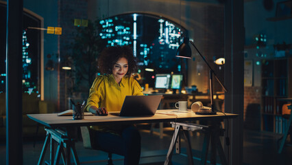 Aufkleber - Expressive Multiethnic Middle Eastern Female Working on a Creative Job Position in an Advertising Company. Manager Brainstorming Ideas, Thinking on a Project. Office at Night.