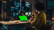 © Gorodenkoff - Creative Multiethnic Female Working on Laptop Computer with Green Screen Mock Up Display. Successful Project Manager Browsing Internet, Writing Tasks, Developing a Marketing Strategy for a Partner.