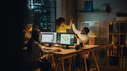 Aufkleber - Art Director and Graphic Designer Discussing a Marketing Campaign for Business Partner. Successful Female and Male Colleagues High Five Each Other. Small Creative Team Working in the Office Together.