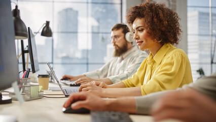 Fototapete - Portrait of Biracial Inspired Young Woman Smiling and Using Laptop in Bright Contemporary Office. Client Advisor Answering Customer Support emails. Team Working on Problem Solving in the Frame