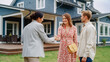 © Gorodenkoff - Happy Couple Shaking Hands with Realtor in Front of Their New Home. Professional Real Estate Agent Congratulating Young Homeowners with Property Purchase, Giving Them the Key to the House.