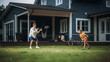 © Gorodenkoff - Young Athletic Father Playing Ball with His Young Son. Dad Teaching the Boy to Play American Football. Kid Learning to Throw the Rugby Ball Correctly. Family Members Playing Outside Their Home.