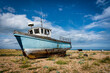 Abandoned and beached fishing vessel