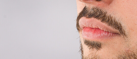 Wall Mural - male lips close-up 