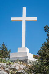 Wall Mural - The white cross on the top of Marjan hill in Split