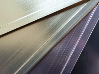 aluminum profile section with color samples contains white gold, rose gold, champagne, black color. powder coating stainless steel profile, close up view, for interior finishing works.