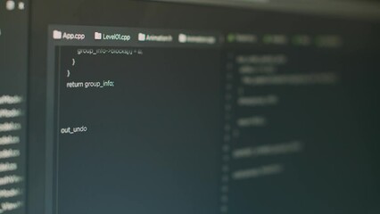 Program code and online cloud database on computer screen, showing temrinal window with html script and data text to develop app with coding and programming. IT system language. Close up.
