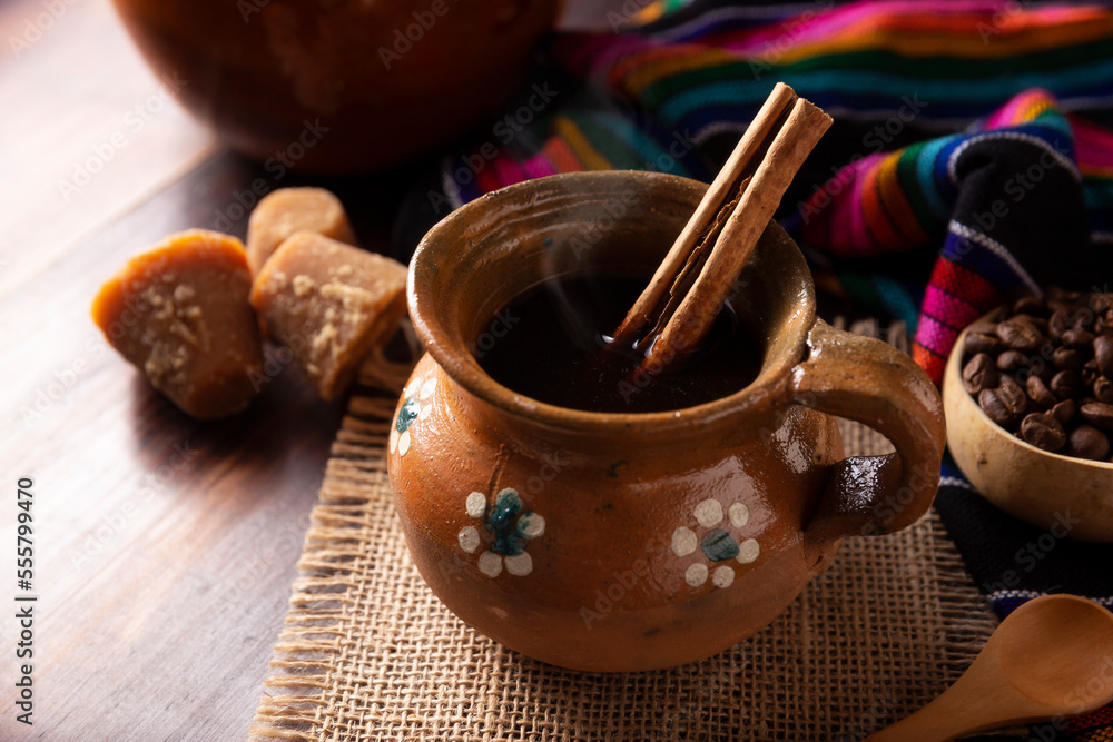 Authentic homemade mexican coffee (cafe de olla) served in traditional