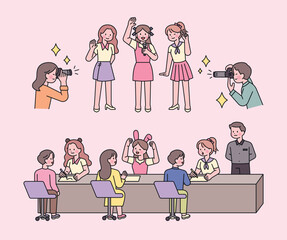 Wall Mural - A girl idol is holding a fan meeting event. Fans take pictures of idols. They are having a conversation at the table.