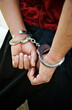 © Designpics - Close-up of Suspect in Handcuffs