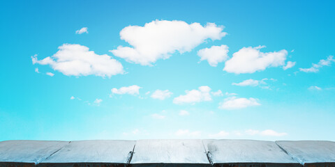 Wall Mural - wooden table, blue sky