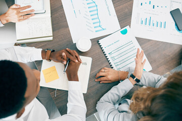 Collaboration, documents and financial with a business team working together in an accounting office from above. Meeting, data and finance planning with a man and woman accountant group at work