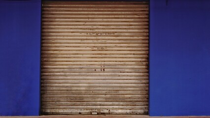 rusty metal rolling door as background