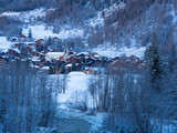 Fototapeta  - Val d'Herens, Switzerland - April 10th 2022: The historic village of Evolene in the early morning light