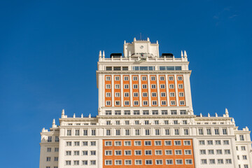 Wall Mural - Madrid downtown. Facade of the skyscraper in Plaza de Espana called Edificio de Espana (Spain Building), 1948-1953 in neo-Baroque style. Community of Madrid, Spain, southern Europe.