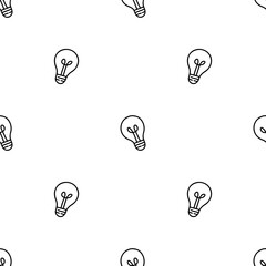 Wall Mural - seamless pattern with sparsely spaced, slightly tilted hand drawn small light bulbs.