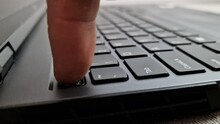 Man Pressing Escape Button On Laptop Computer Keyboard, Finger Pushing Esc Key. Quitting Software, Business And Technology Concept